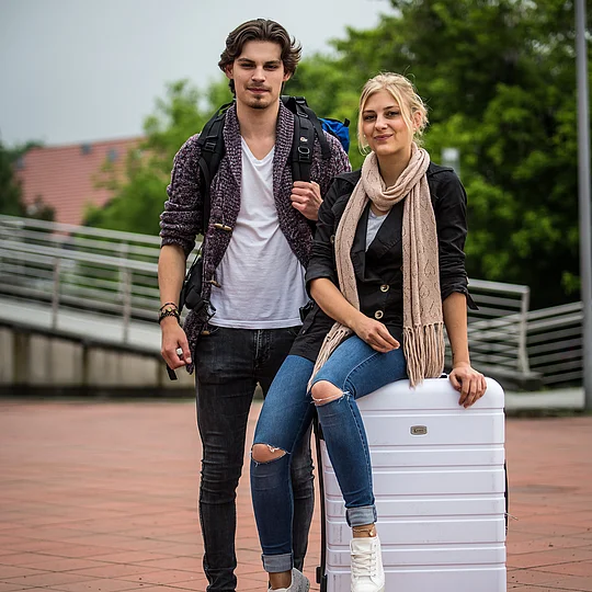 Volunteers with luggage